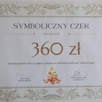 1- symboliczny czek z kwotą przeznaczoną do wykorzystania na klaswe wyjście_ nagroda dla klasy 3A.jpg