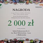 baner z przyznaną szkole nagrodą w wysokości 2000 zł.